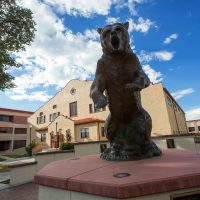 Old Mose Grizzly bear in front of Rex Activity Center Adams State Campus
