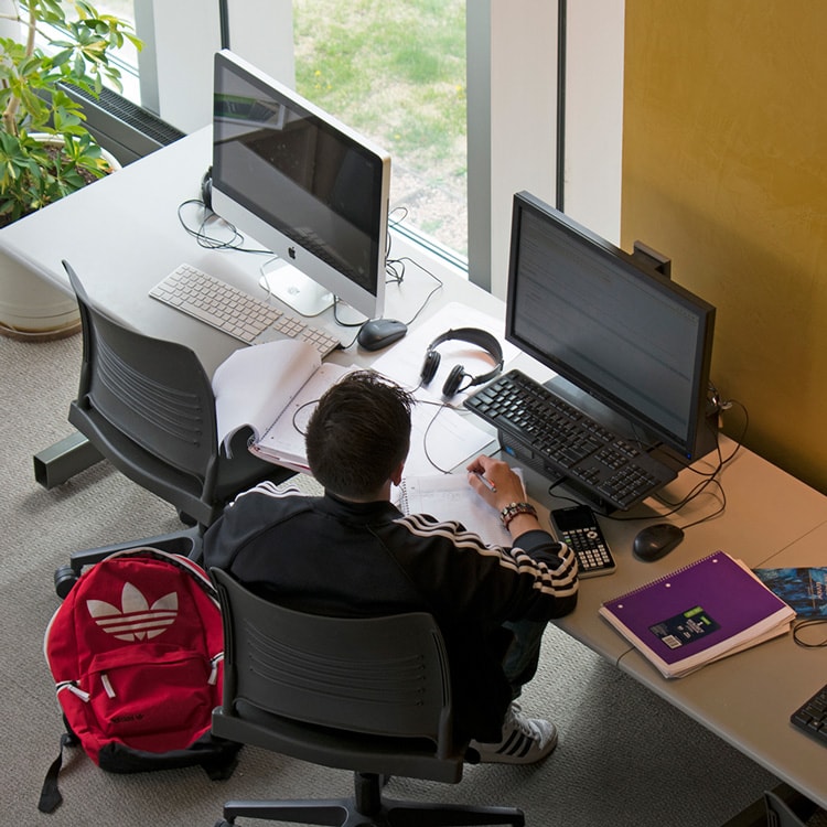 Student studying in McDaniel Hall