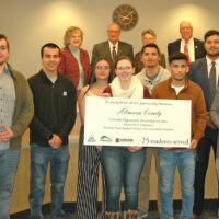 Alamosa County Commissioners with Adams State students and staff