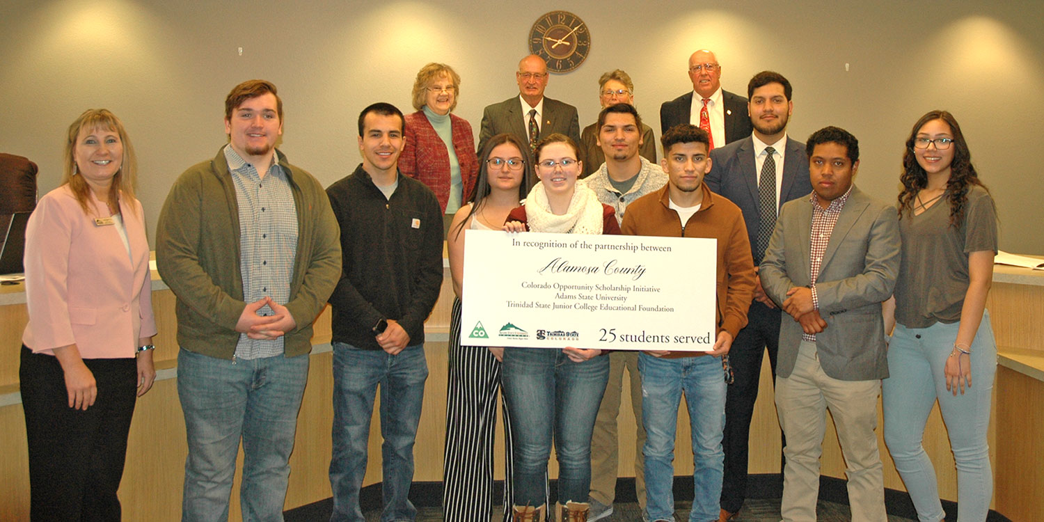 Alamosa County Commissioners with Adams State students and staff