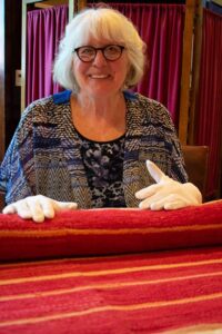 Nancy Hagood with Rio Grande weaving