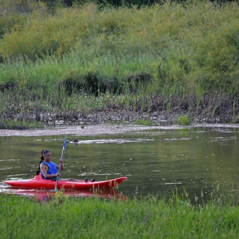 student paddling on the rio grande