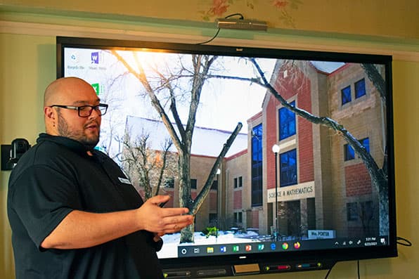 Alfonso Velasquez demonstrates Smartboard 