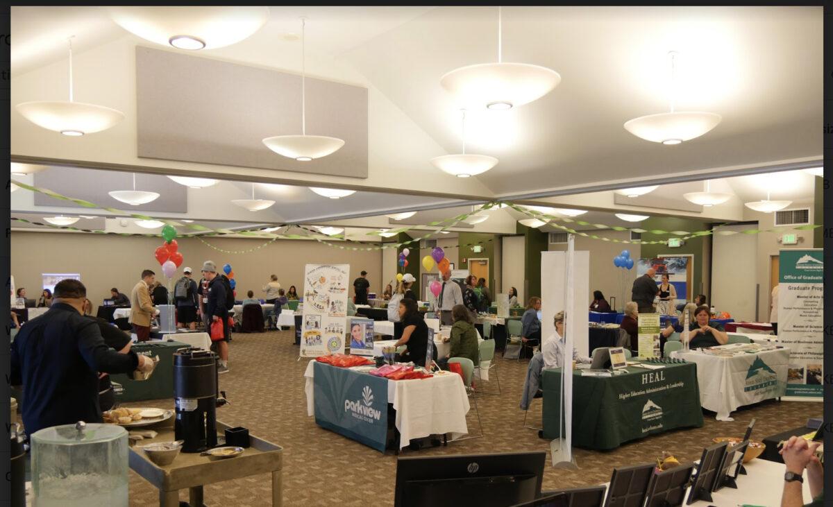 People attend a Career Services event in the Student Union Building ballrooms on campus.