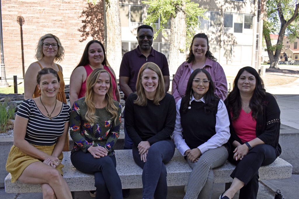 Members of Adams State's Counselor Ed Ph.D. Cohort 10 pose for a decorative photo. 