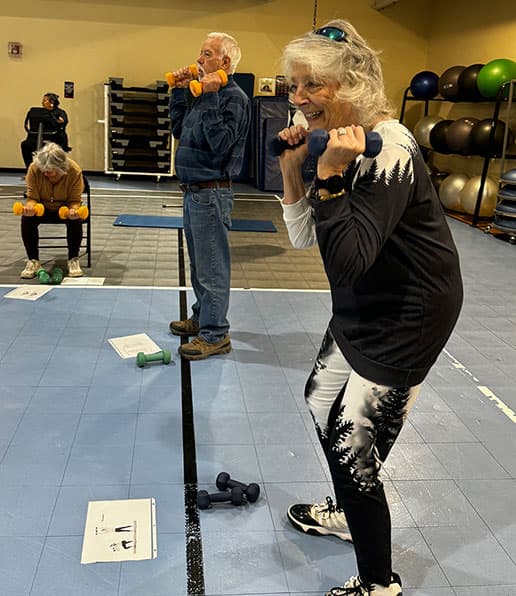 Adams State University Larry Holder Study participants lift weights