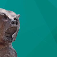 Adams State University Old Mose sculpture on green backgound