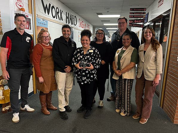 Pictured, left to right, Centauri Middle School Principal Brian Riccatone, Adams State University School of Education Dr. Michele Mann, Dr. Curtis Garcia, September Educator Highlight Award Pat Naranjo, Adams State School of Education Dr. Justine Schwarz, Paul Clark, Dr. Janene Mondragón, and Acacia Nadeau-Lara.