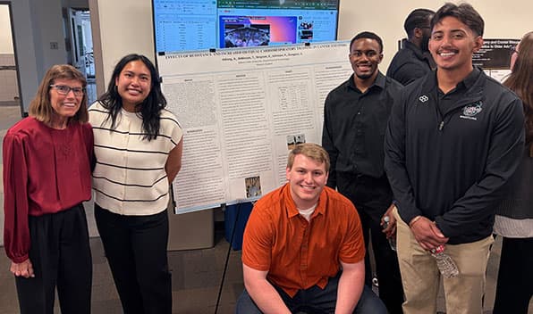 Dr. Tracey Robinson, Abby Adiong, Ronan Melani, Keirryse Simpson, and Sergio Zaragoza at the Rocky Mountain American College of Sports Medicine (RMACSM) Conference 