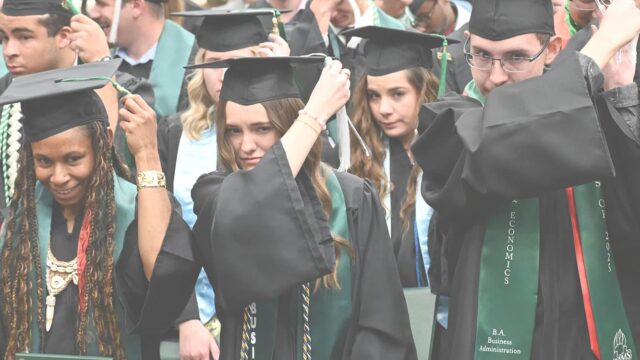 Adams State University 2025 Fall Commencement Ceremony graduates switching tassels