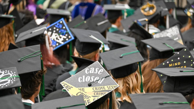 Adams State University 2026 Spring Commencement Ceremony rows of graduates caps