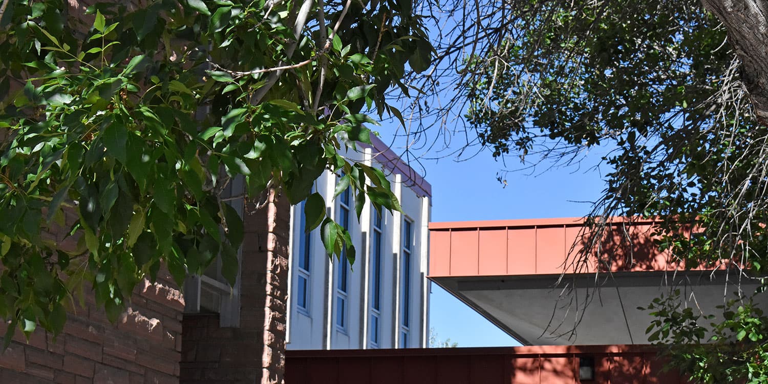 Adams State University Student Union Building with trees