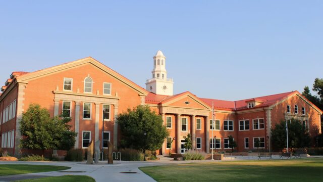 Adams State University Richardson Hall with campus green