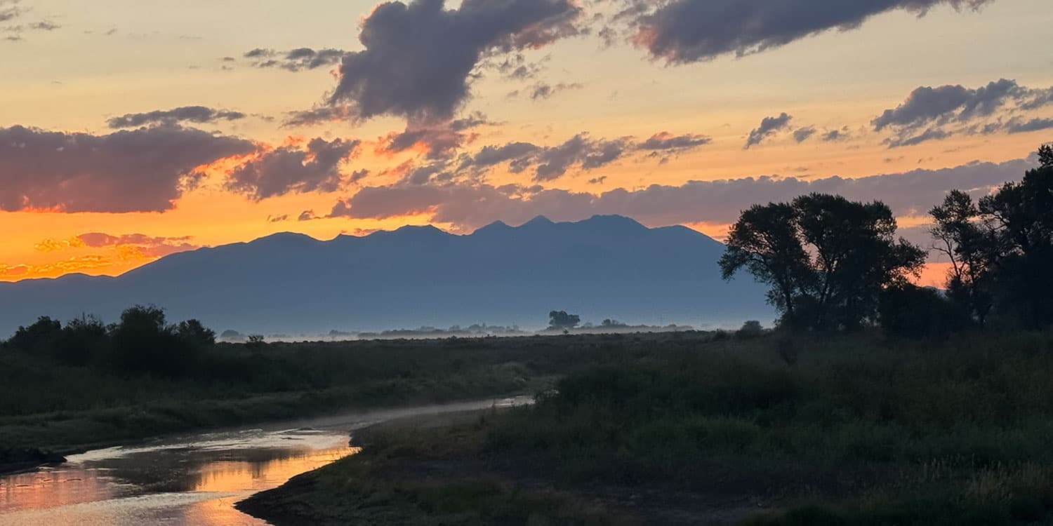 Mt. Blanca and Rio Grande at sunrise in July at the Alamosa Riparian Park