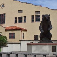 Adams State University Rex Activity Center and Old Mose, a bronze sculpture of the grizzly mascot