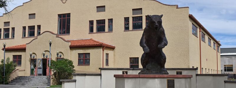 Adams State University Rex Activity Center and Old Mose, a bronze sculpture of the grizzly mascot