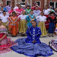 Adams State University Semillas de la Tierra dancers in front of Richardson Hall