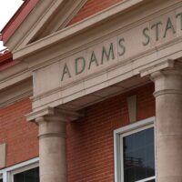 Adams State University Richardson Hall front entablature with words "Adams State"