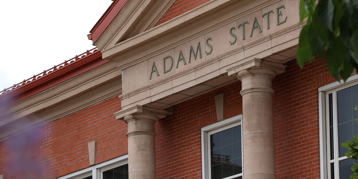 Adams State University Richardson Hall front entablature with words "Adams State"