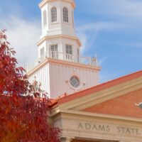 Adams State University Richardson Hall with autumn colors in tree
