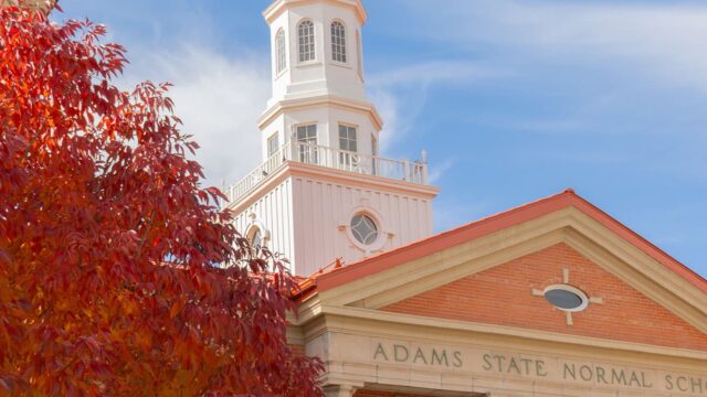 Adams State University Richardson Hall with autumn colors in tree