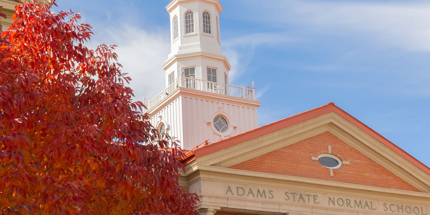 Adams State University Richardson Hall with autumn colors in tree